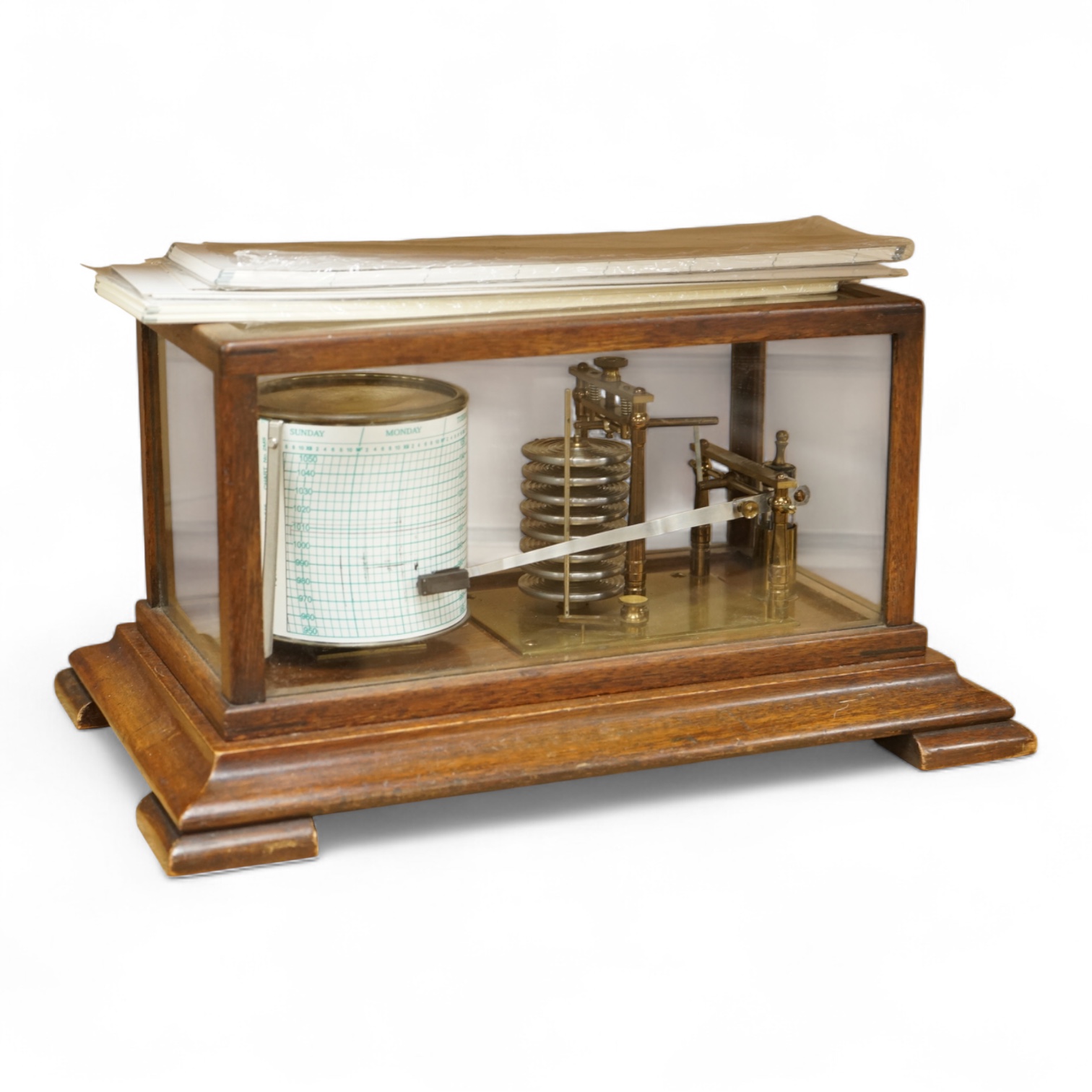An early 20th century mahogany cased barograph by an unknown maker, with a quantity of unused papers.